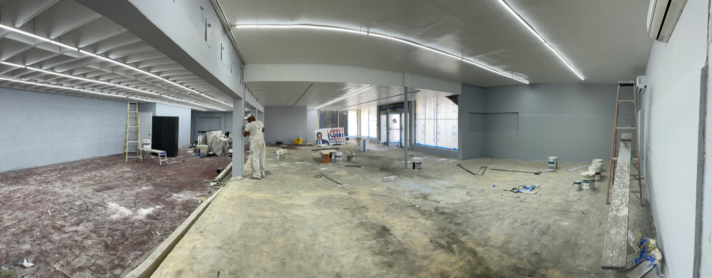 01 · Panoramic view of the former retail floor · Before the 2024–2026 conversion